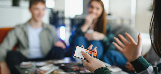 friends playing with get to know each other cards
